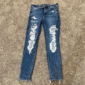 Medium wash skinny jeans, super stretchy and comfy, rips look good on.